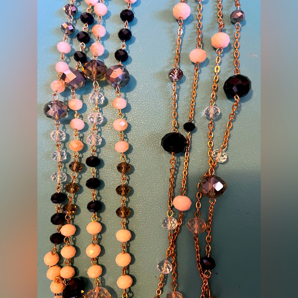2 necklaces & 1 matching pair of earrings